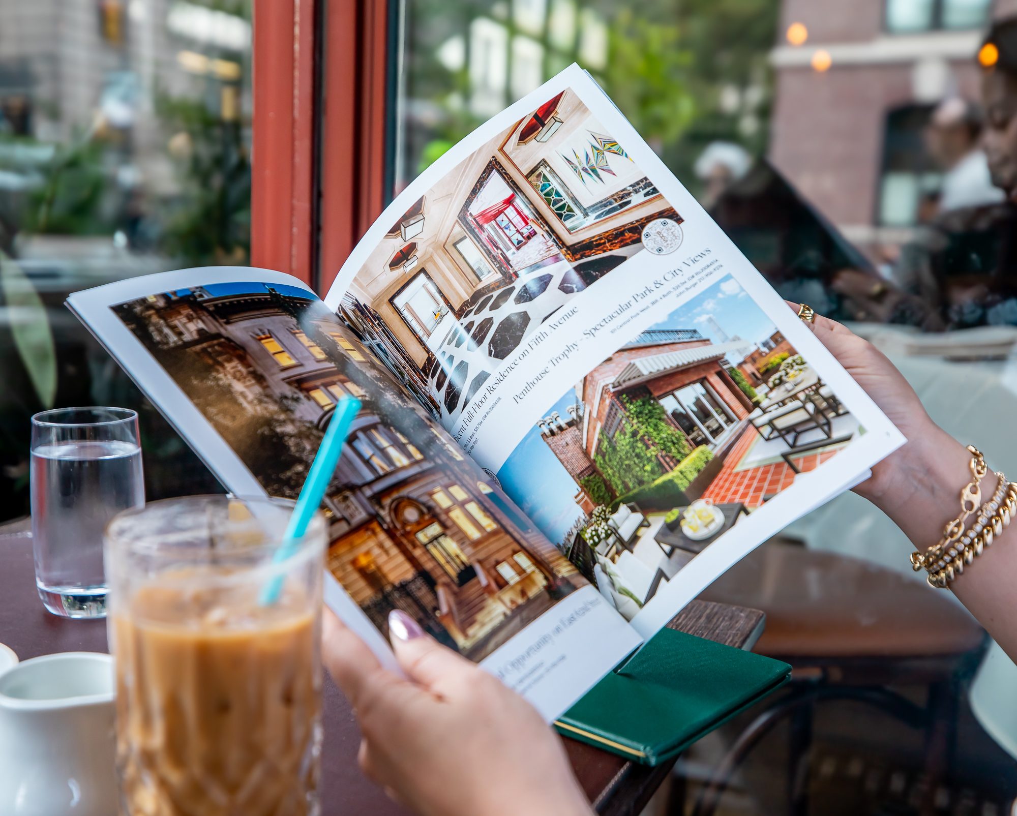 Paging through a magazine of New York homes over iced coffee